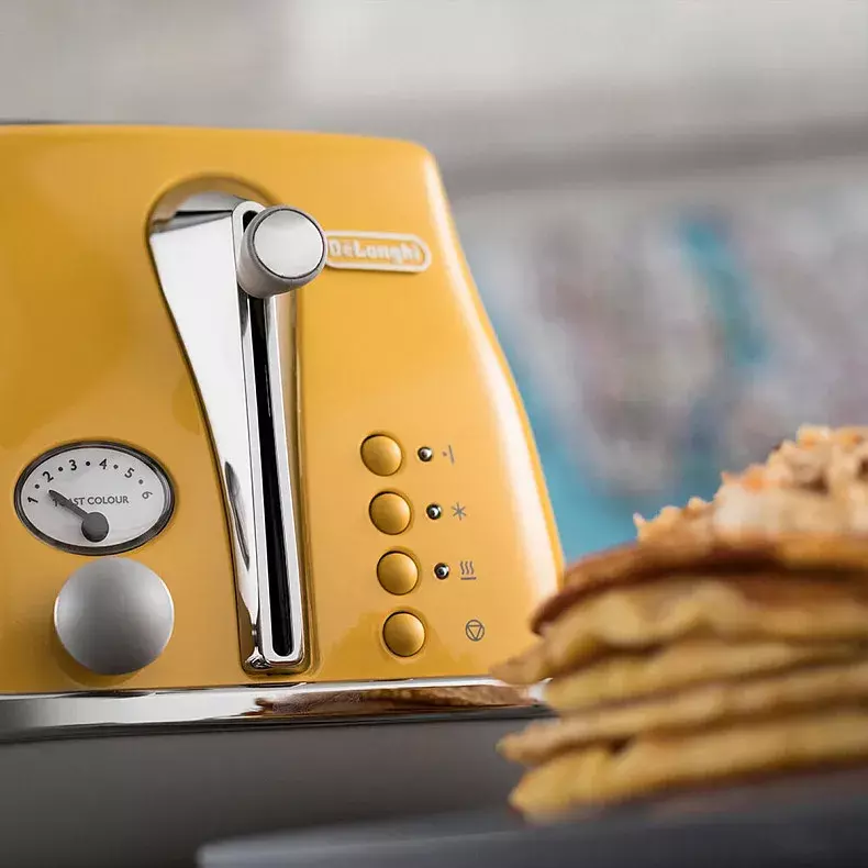 Тостер DeLonghi CTOC 2103 Y - фото - №4