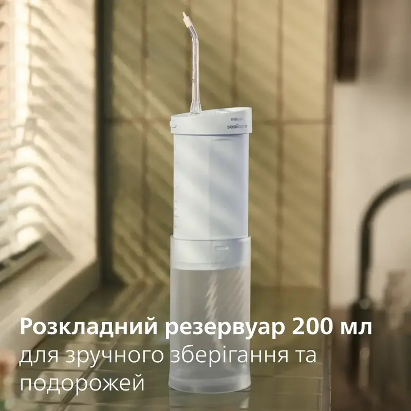 Ирригатор PHILIPS Sonicare HX3333/24 Compact Flosser 1000 - фото - №7