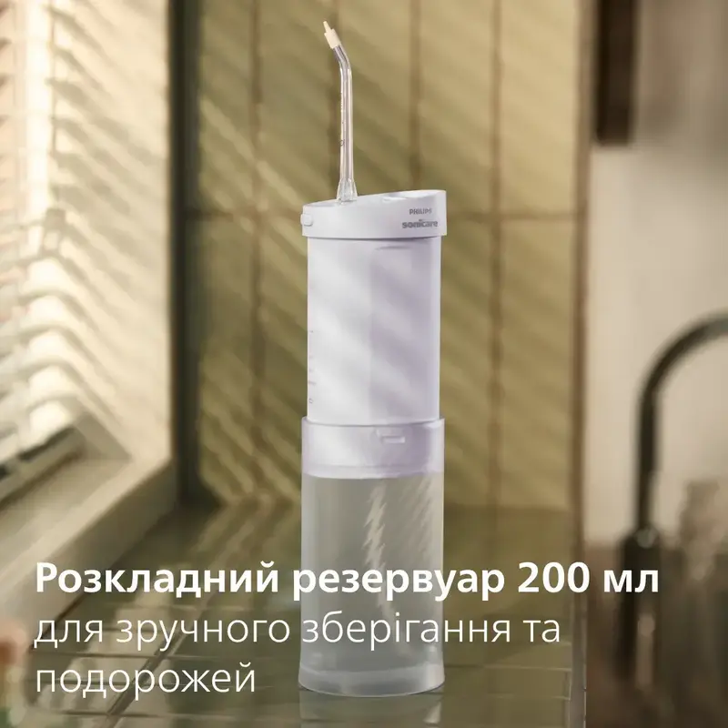 Ирригатор PHILIPS Sonicare HX3333/23 Compact Flosser 1000 - фото - №7