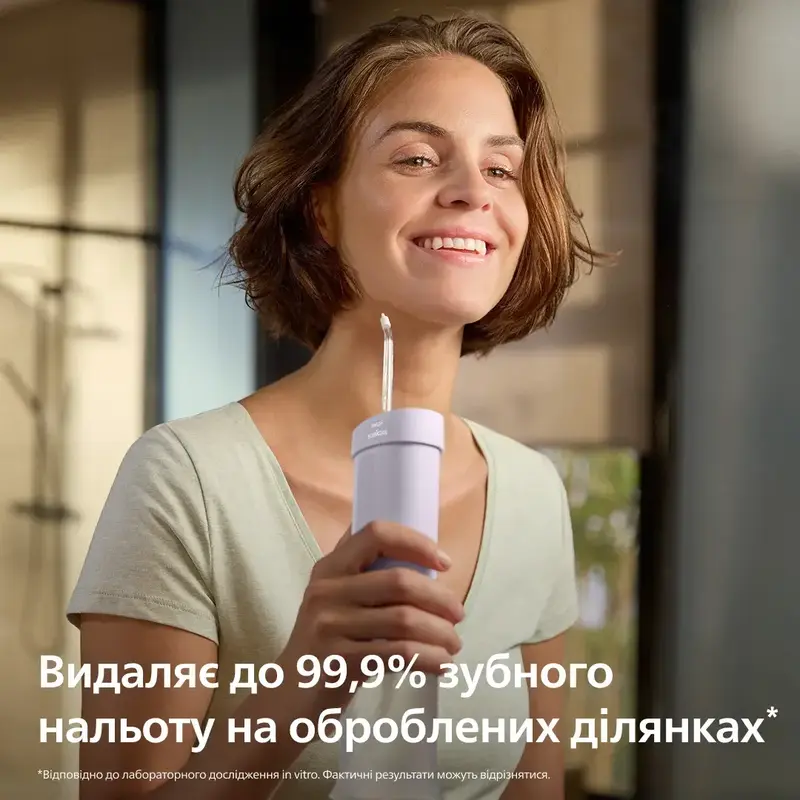 Ирригатор PHILIPS Sonicare HX3333/23 Compact Flosser 1000 - фото - №1