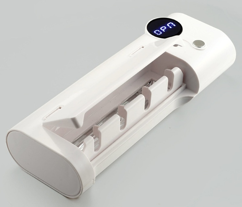 Настінний тримач-стерилізатор для зубних щіток фото